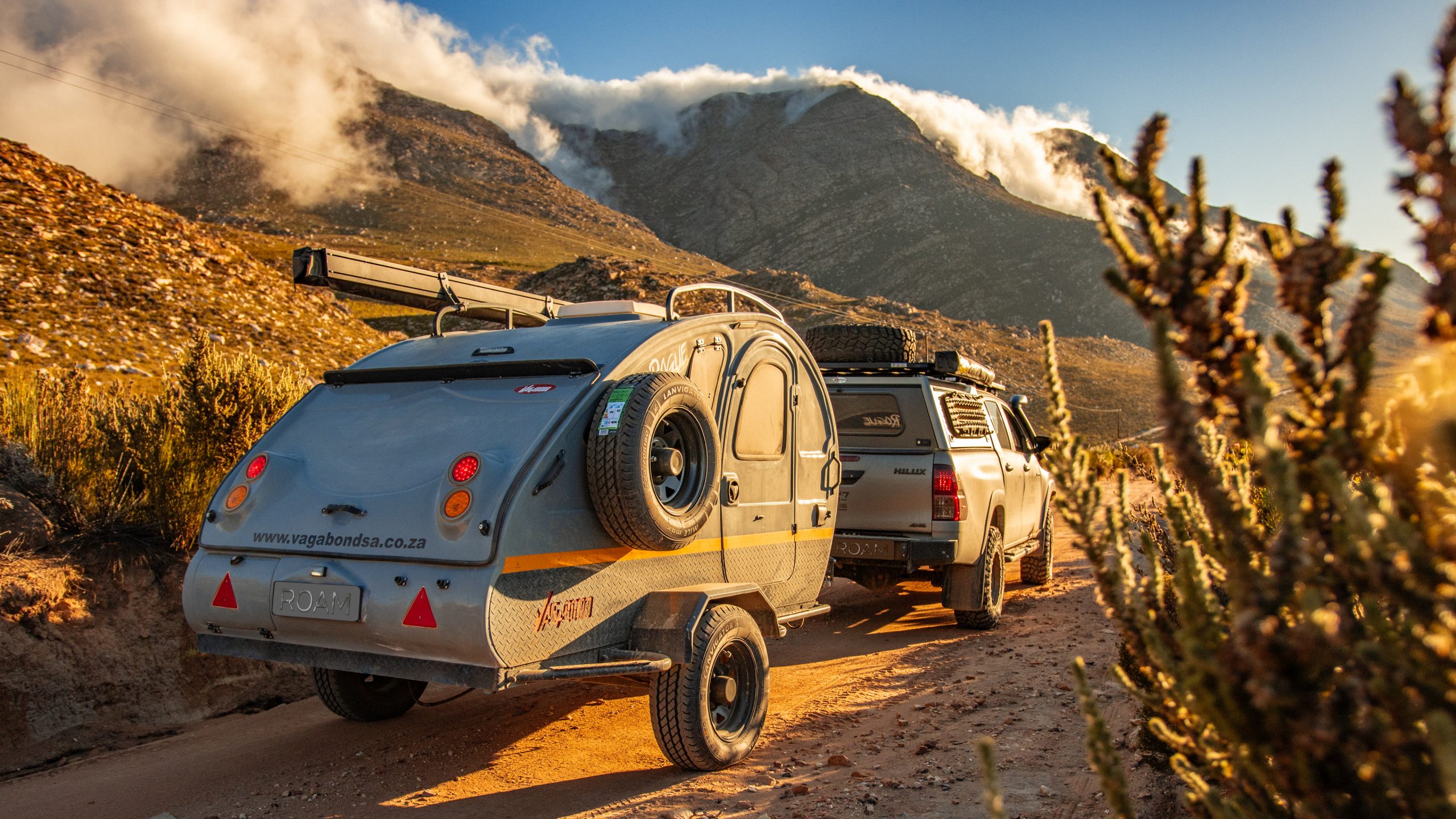 Vagabond teardrop caravan on a misty mountain road