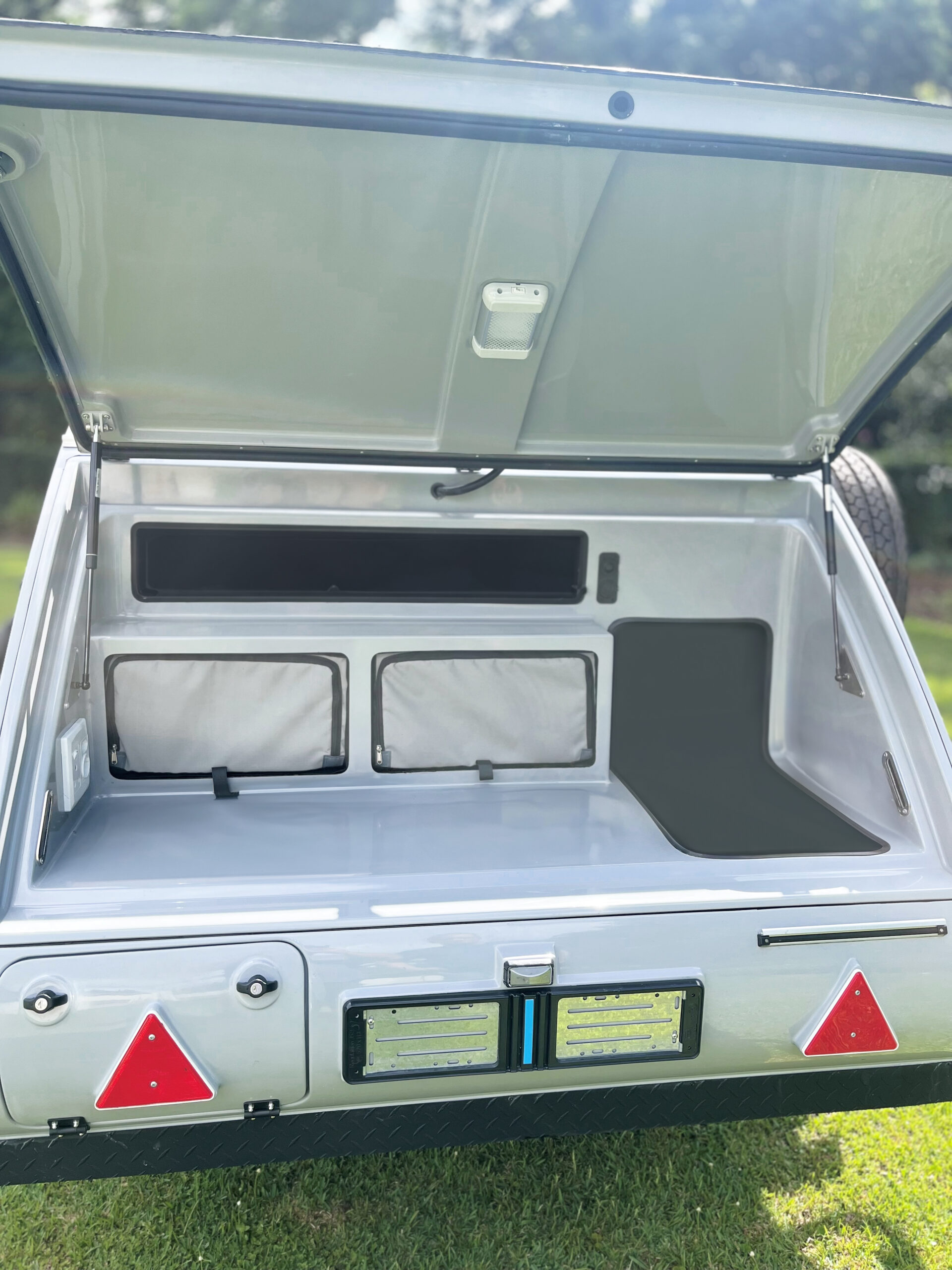Vagabond Roamer rear galley kitchen open with storage