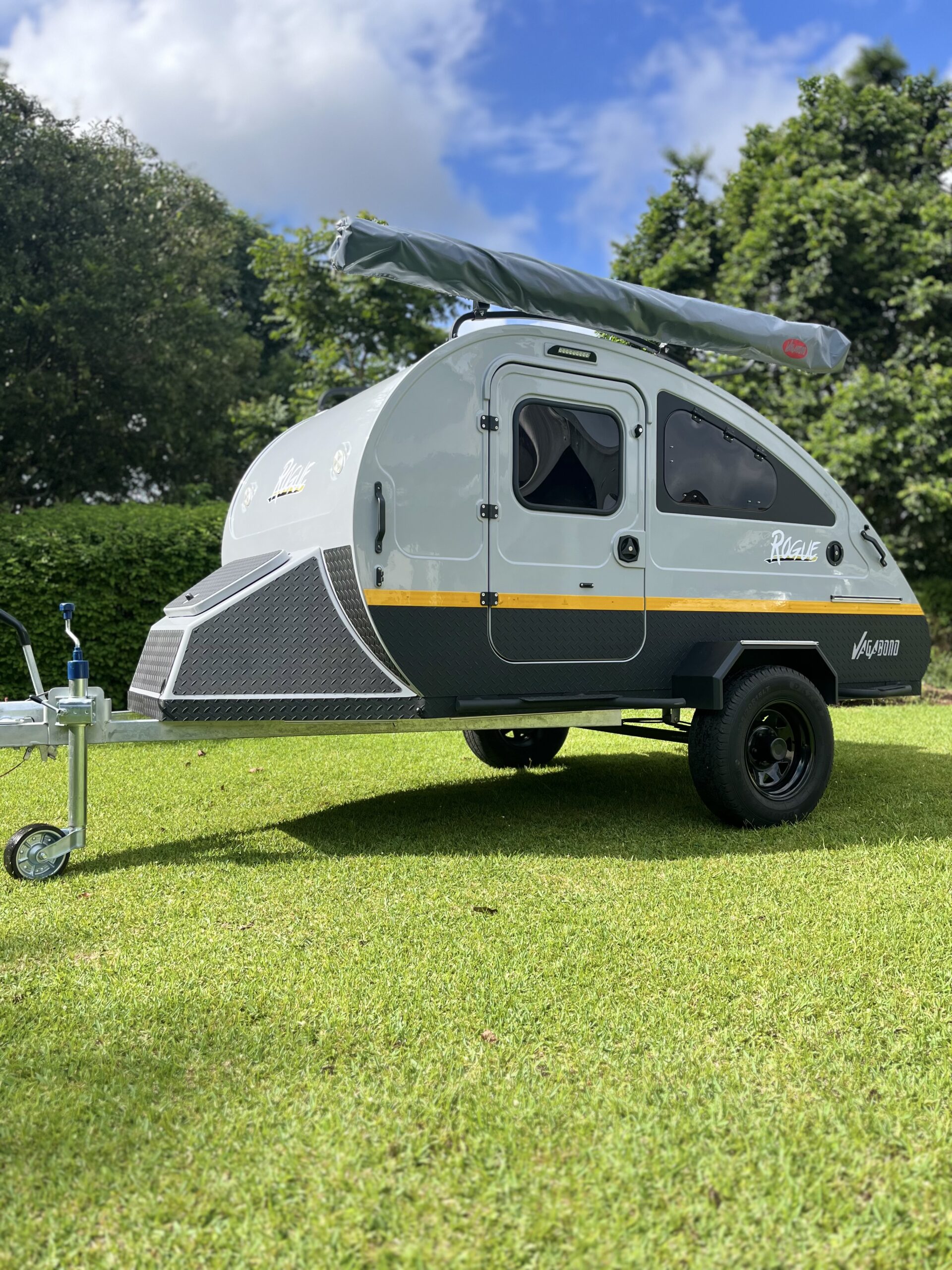 Vagabond Rogue side profile with branding and awning